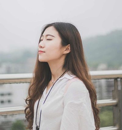 woman smiling outside